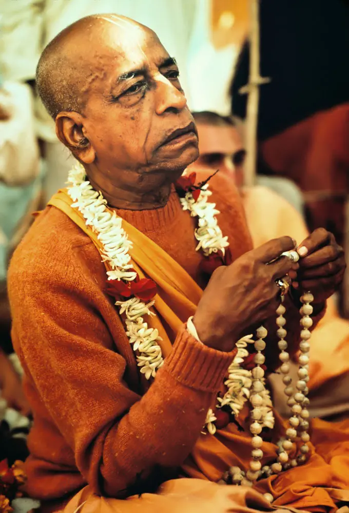 Prabhupada Chanting on New Disciple\'s Japa Beads at Initiation Ceremony