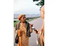 Srila Prabhupada Carrying a Cane on a Morning Walk Srila Prabhupada Carrying a Cane on a Morning Walk