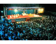 Prabhupada With a Group of Disciples at a Preaching Program in India Prabhupada With a Group of Disciples at a Preaching Program in India
