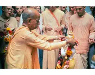 Srila Prabhupada offers a Flower Garland to Sri Sri Radha Paris-Isvara Srila Prabhupada offers a Flower Garland to Sri Sri Radha Paris-Isvara